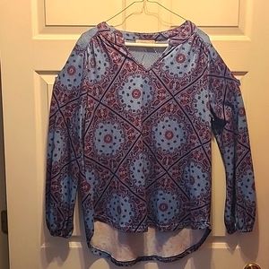 Women's leisure blouse. Blue and red design with knitt detail on back
